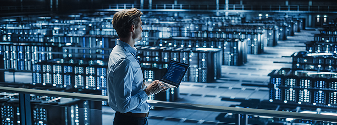 Engineers checking servers in a data center